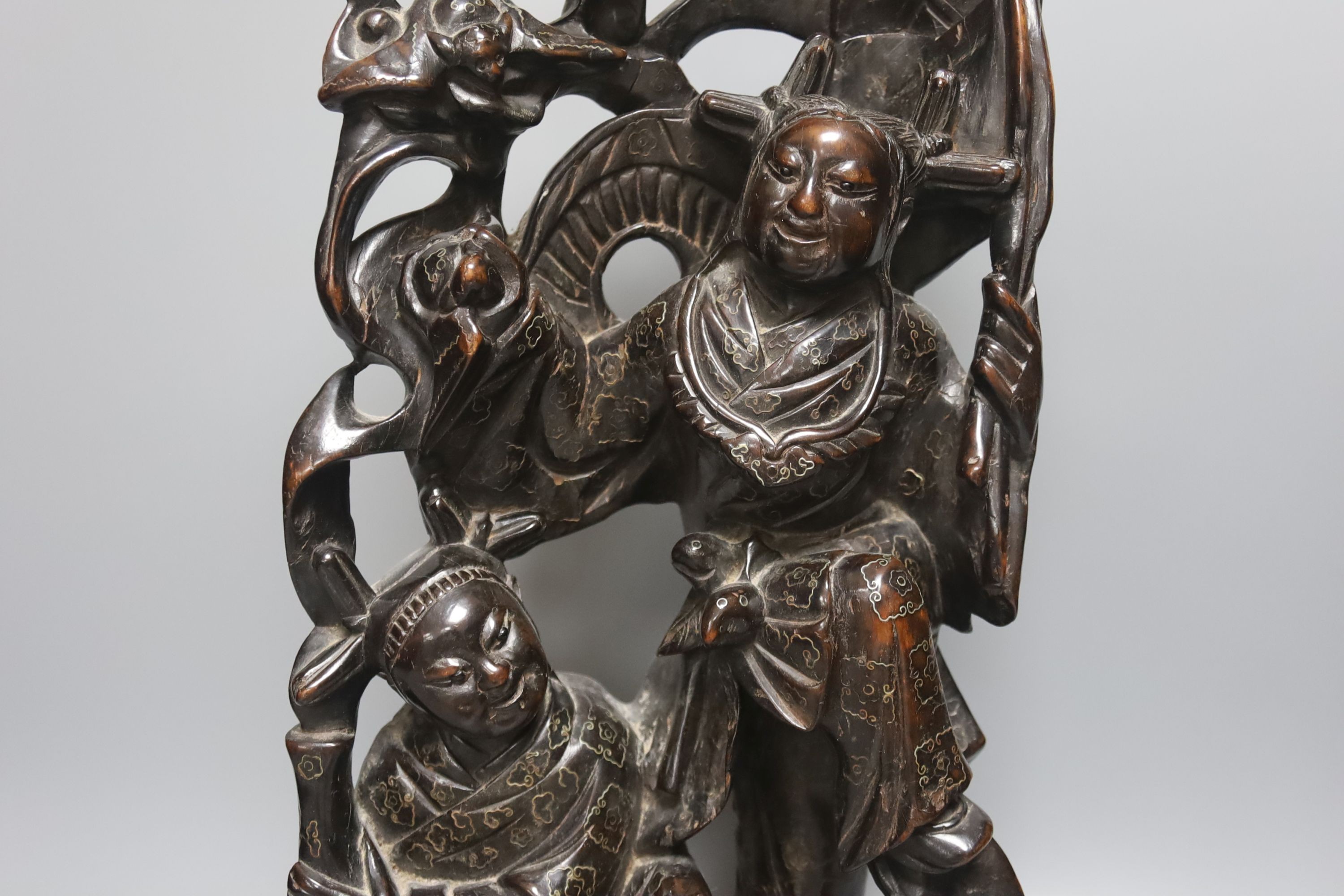 A Chinese hardwood and wire inlaid group of the He He Erxian and a similar figure of Budai, both early 20th century, tallest 49cm